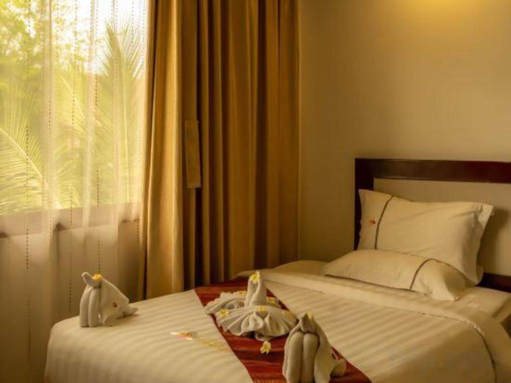 Xishuangbanna Hotel Managed By Xandria Hotel Luang Prabang Bagian luar foto