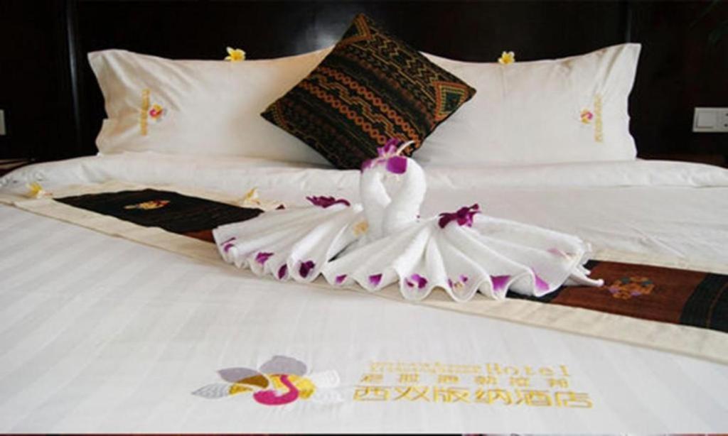 Xishuangbanna Hotel Managed By Xandria Hotel Luang Prabang Bagian luar foto