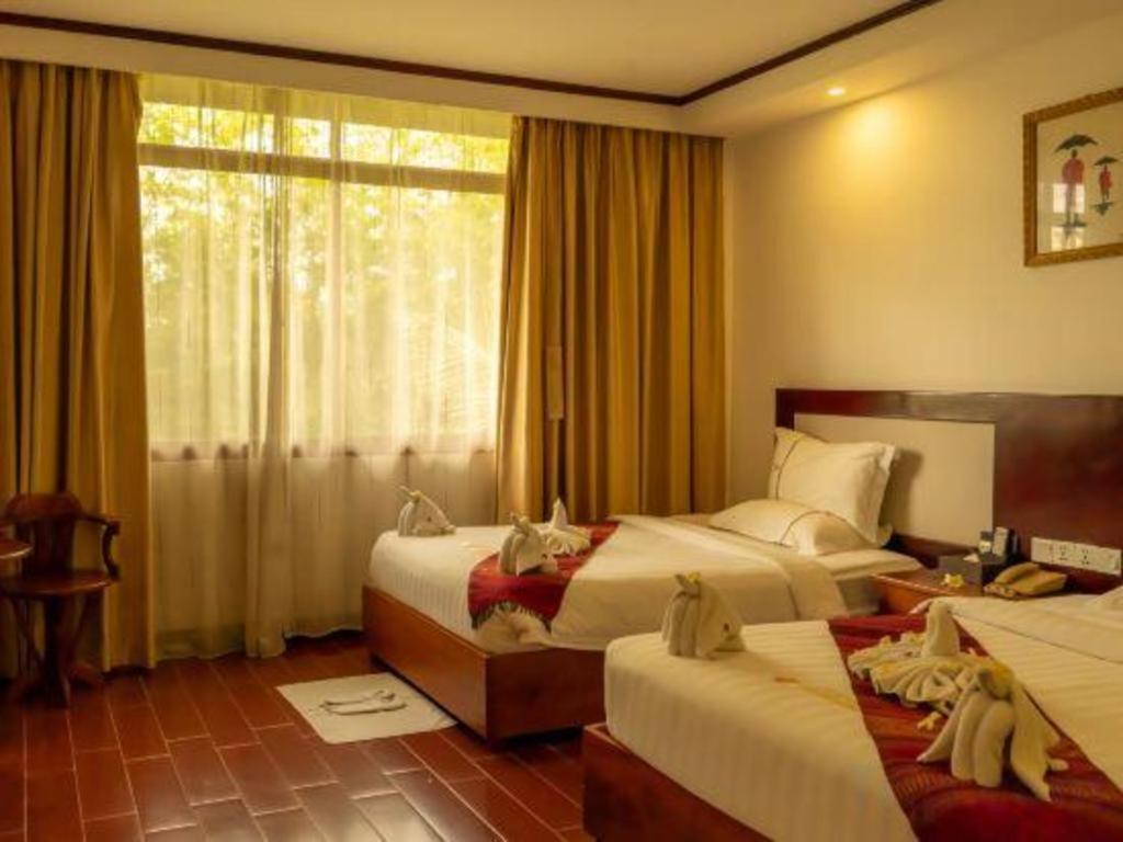 Xishuangbanna Hotel Managed By Xandria Hotel Luang Prabang Bagian luar foto